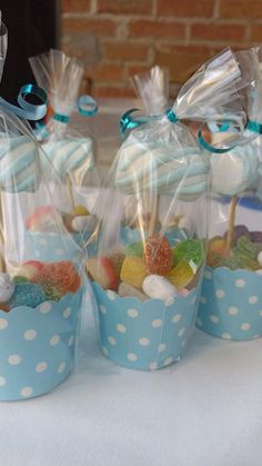 small blue polka dot cups filled with candy