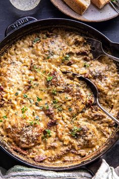 a casserole dish with meat and cheese in it