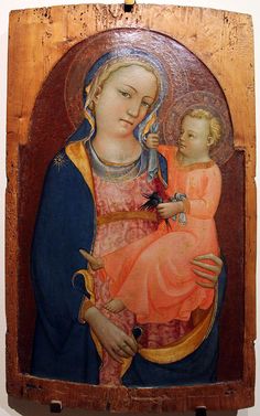 an old wooden painting with a woman holding a baby in her lap and the child's hand