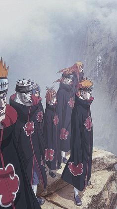 several anime characters standing on top of a mountain