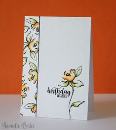 a birthday card with flowers on it