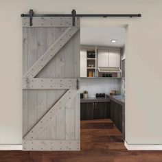 an open sliding barn door in a kitchen