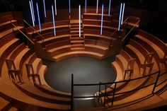 an aerial view of a circular stage with stairs