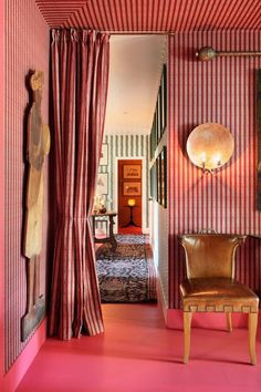 a room with red and white striped walls