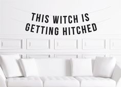 this is an image of a living room wall decal with the words'this witch is getting hitched '