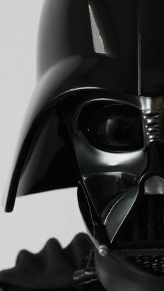 a darth vader helmet is shown in black