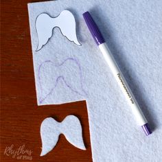 a piece of paper that has been cut out to look like a toothbrush and mustache