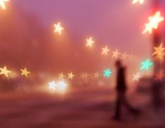 a blurry image of stars on the street