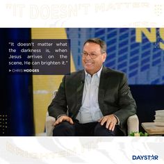 a man sitting in a chair with a quote on it