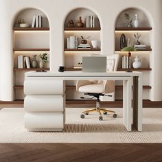 a white desk with a laptop on it in front of some bookshelves and shelves