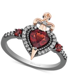 Enchanted Disney Villains Rhodolite Garnet (7/8 ct. t.w.) & Diamond (1/6 ct. t.w.) Evil Queen Heart & Sword Ring in 14k Rose Gold & Black Rhodium-Plated Sterling Silver Evil Queen Costume, Black Rhodium Ring, Enchanted Disney Fine Jewelry, Enchanted Disney, Disney Fine Jewelry, Oval Moissanite Ring, Queen Jewelry, Rhodolite Garnet, Evil Queen