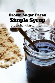 brown sugar pecan simple syrup recipe in a jar with spoon