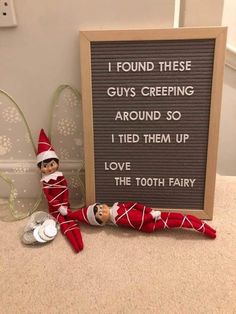 an elf is next to a sign that says i found these guys creeping around so i tried them up love the tooth fairy