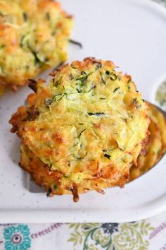 two crab cakes on a white plate