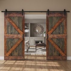 an open door leading to a living room with wood floors and furniture in the background