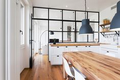 the kitchen is clean and ready to be used as a dining room or office space