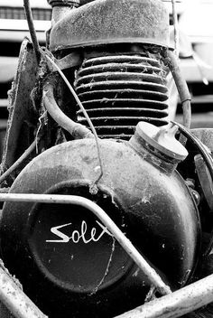 black and white photograph of an old motorcycle