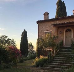 a house with steps leading up to the front door