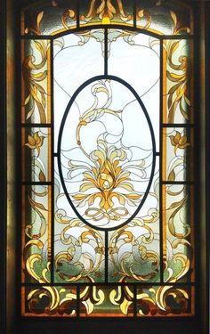 a stained glass window with an oval design