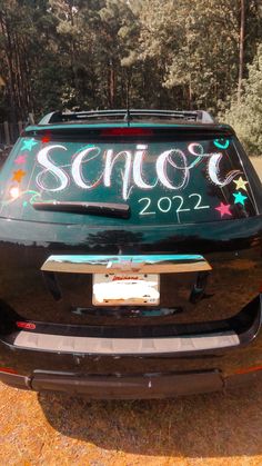 the back end of a car with writing on it that says school 2012 - 2013