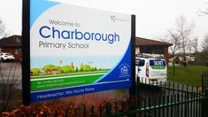 there is a sign that says welcome to charlotte primary school