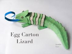 an egg carton lizard ornament made out of paper