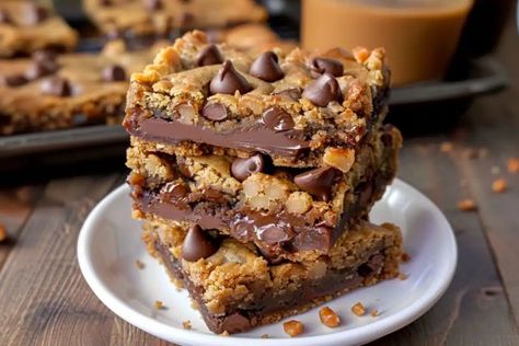 Peanut Butter Cup Gooey Cookie Bars Recipe - CookesRecipes Peanut Butter Gooey Cookie Bars, Peanut Butter Cup Gooey Bars, Peanut Butter Cup Gooey Cookie Bars, Gooey Cookie Bars, Making Peanut Butter, Gooey Bars, Breakfast Soup, Peanut Butter Cup Cookies, Gooey Cookies