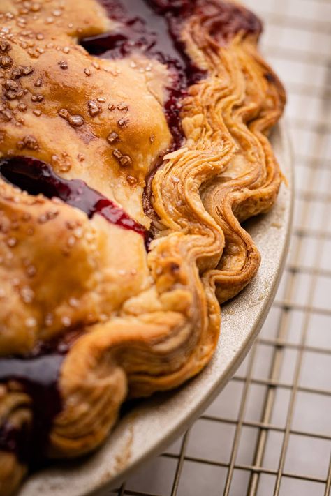 Using a few simple ingredients and an easy folding technique, you can make super flaky pie crust at home. This recipe yields a flavorful puff pastry-like flaky pie crust that will leave everyone impressed. Croissant Pie Crust, Flakey Pie Crust Recipes, Flakiest Pie Crust Ever, Best Flaky Pie Crust Recipe, Ways To Use Pie Crust, Puff Pastry Pie Crust, Flaky Pie Crust Recipe Butter, Best Pie Crust Recipe Flaky, Flavored Pie Crust