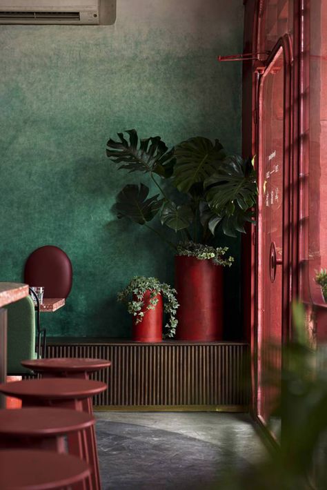 Red5studio built cafe evoking a retro spirit with hues of red colors and lights in Vietnam Bar Interior Design Restaurant, Mid Century Color Scheme, Chinese Cafe, Colorful Cafe, Coffee Gallery, Architecture Restaurant, Coffee Shop Interior Design, Retro Cafe, Bar Interior Design