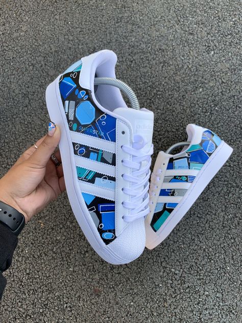 Custom Hand Painted Adidas Superstars - Blue Freestyle Design Painted On Side Panels - Paint Is Crack And Water Resistant - !st Class Worldwide Shipping - No Returns On Customised Items Custom Painted Adidas, Custom Adidas Shoes, Adidas Custom Shoes, Painted Adidas Superstar, Adidas Superstar Custom, Adidas Superstar Blue, Custom Adidas Superstar, Painted Adidas, Adidas Custom