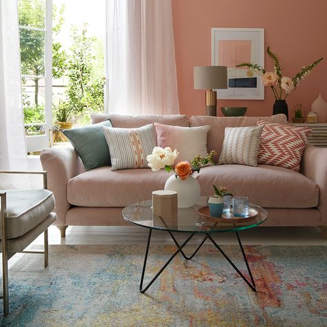 This earthy, faded-terracotta tone will give your living room a natural glow. We recommend trying this colour if your furniture is simple and modern. Peach Living Rooms, Pink Sofa Living Room, Terracotta Living Room, Coral Living Rooms, Blush Living Room, Blush Pink Living Room, Perfect Living Room Decor, Pink Living Room Decor, Turquoise Living Room Decor