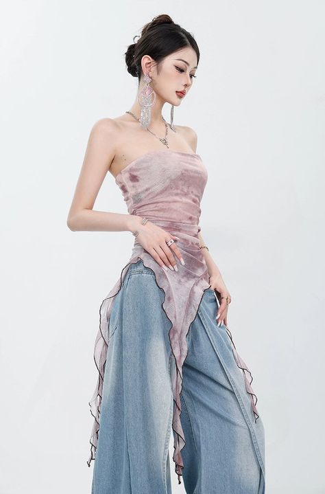 Usher in the summer with a splash of color with our Tie-Dye Ruffled Mesh Tulle Tube Top. This piece stands as a testament to the effervescent yet relaxed spirit of contemporary fashion. Crafted from a delicate tulle mesh, this top features a playful tie-dye pattern, giving each piece a unique character. Ruffled edges cascade to enhance the texture, creating an ensemble that is as breezy as it is beautiful. Its slim-fit cut brings a touch of elegance to the casual style, allowing for versatile we Tulle Tube Top, 2004 Fashion, Everyday Fashion Outfits, Skirt And Top Set, Contemporary Fashion, Top Pattern, Aesthetic Outfits, Tube Top, Dress To Impress