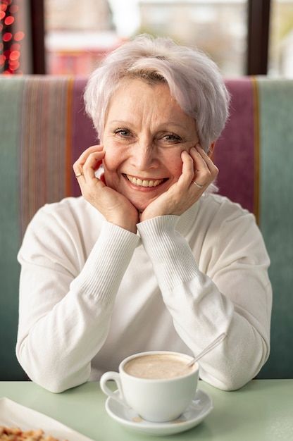 Photo front view elder smiley woman at r... | Premium Photo #Freepik #photo #woman-relaxing #senior-woman #woman-coffee #elderly-woman Poses For Elderly Women, Elderly Portrait Photography, Elderly Photoshoot, Elderly Photography, Age Photography, Elderly Women, Woman Relaxing, At Restaurant, Elderly Person