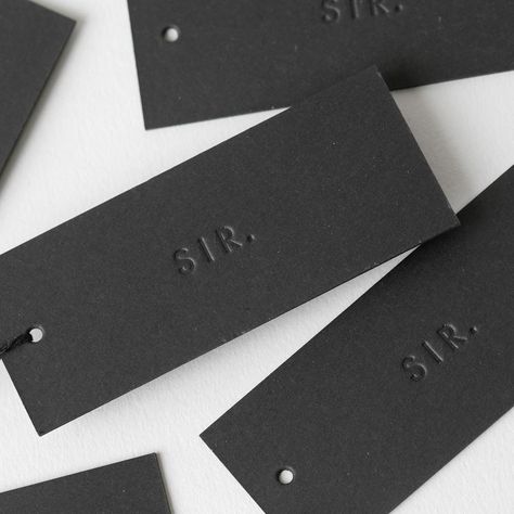 Stitch Press on Instagram: “Blind deboss on 600gsm black card | swing tags for @sir_thelabel 🖤” Logos, Price Tag Design, Print Techniques, Hang Tag Design, Sir The Label, Black Packaging, Shirt Tag, Swing Tag, Business Card Branding