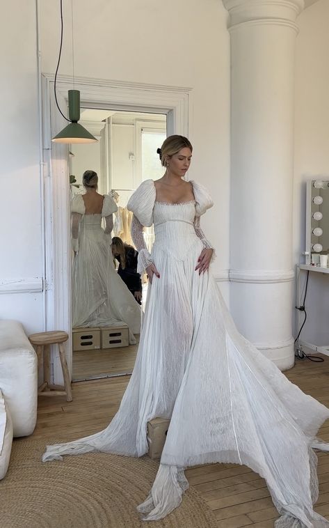 Stunning wedding dress with statement sleeves and draped a line skirt. The macye dress by cinq bridal Hoodie Wedding Dress, Juliette Sleeve Wedding Dress, Puff Sleeve Lace Dress, Statement Sleeves Wedding Dress, Wedding Dresses Cinq, Drop Waist Long Sleeve Wedding Dress, Cinq Bridal Dresses, Vintage Wedding Dresses With Sleeves, Drop Waist Wedding Dress With Sleeves