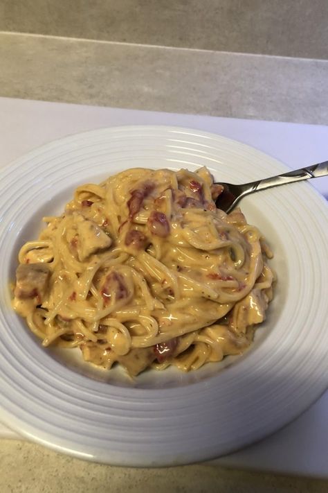 Quick and Easy Chicken Spaghetti | "This a great busy night dinner. With all of the prep work done the night before, this can be on the table in about 30 minutes! I used leftover grilled chicken and added garlic, onions, and green bell peppers that have been sauteed for a few minutes. I also throw in a couple of dashes of chili powder. This is great with a green salad and Jiffy cornbread!" #allrecipes #pasta #pastarecipes #pastainspiration #pastadinner #pastaideas #pastadinner #pastaideas Easy Chicken Spaghetti Recipe, Easy Chicken Spaghetti, Chicken Mushrooms, Chicken Spaghetti Recipes, Spaghetti Recipe, Chicken Spaghetti, Cooked Chicken, Creamy Cheese, Läcker Mat