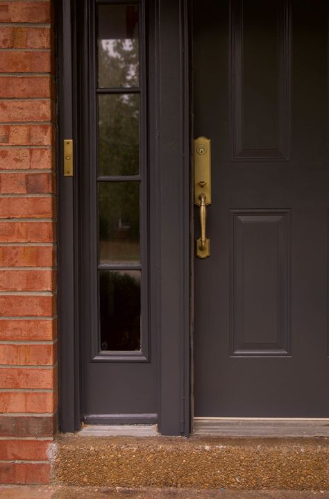 Black Front Door With Red Brick House, Front Door On Colonial House, Black Door Grey House, Dark Grey Front Door Exterior, Painted Brown Front Door, Front Door Black Paint Color, Front Door Colors Brown House, Brown Painted Front Door, Grey Door Exterior