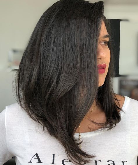 #29: Chic Inverted Black Lob Long Inverted Haircut, Assymetrical Haircut Long Hair, Slanted Lob Haircut, Haircuts For Medium Black Hair, Extra Long Lob Haircut, Inverted Lob With Layers, Long Angled Bob With Layers Round Faces, A Symmetrical Bob Long, Lob Haircut Black Hair