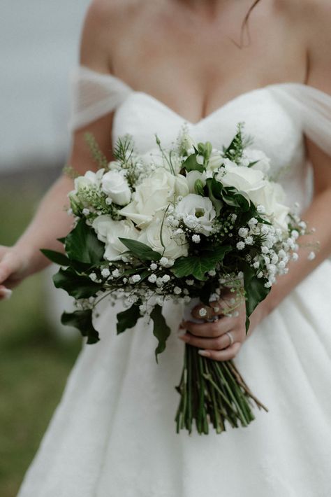 Hand-tied Bridal Bouquet in cool whites and dark green designed by Justine, Oban Florist, The Thistle & The Rose Dark Green And White Bouquet Wedding, All White And Green Bouquet, Bridal Flowers Bouquet White And Green, Wedding Flower Arrangements Green And White, White And Green Hand Tied Bouquet, White And Green Flower Bouquet Wedding, Elegant Bridal Bouquets White, Dark Green Wedding Flowers Bouquets, Dark Green Wedding Boquet