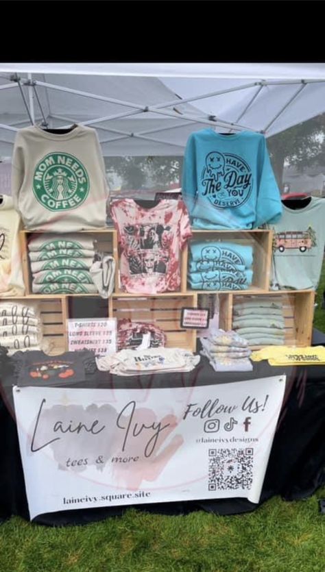 Vendor Boutique Display, How To Set Up A Shirt Booth, Tshirts Display Ideas, Best Vendor Booth Displays, Clothes Display Ideas Booth, Pop Up Shop Display Ideas Craft Booths, Shirt Vendor Booth Display Ideas, T Shirt Craft Show Display, Boutique Set Up Craft Booths