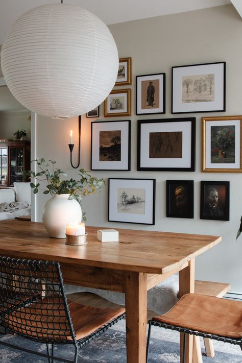 Create a Collected Gallery Wall Look | liannecarey.com Dining Room Wall Frames Ideas, Moody Dining Room White Walls, Gallery Wall Ideas With Sconces, Moody Kitchen Nook, Gallery Wall Over Credenza, Picture Wall In Dining Room, Art Gallery Wall Dining Room, Family Photo Wall Ideas Dining Room, Dining Back Wall Design