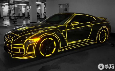 This incredible looking Nissan GT-R has been outlined with fluorescent tape outlining every crease, curve and ridge of Godzilla. Carros Lamborghini, Gtr Nissan, R35 Gtr, Car Wrap Design, Nissan Gt R, Cool Sports Cars, Nissan Gt, Car Mods, Car Graphics