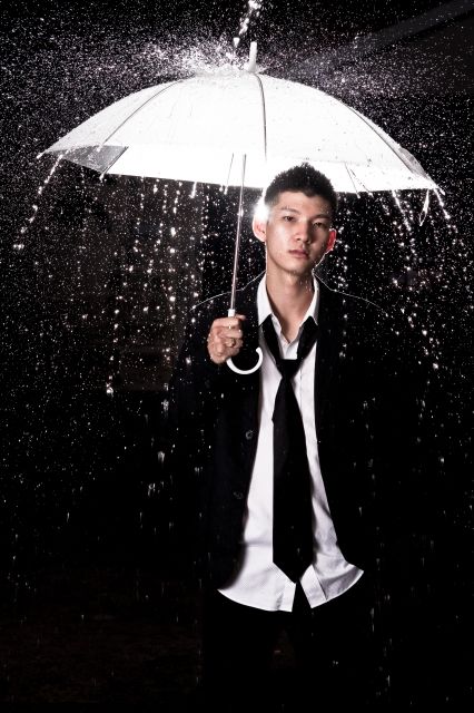 Young man with umbrella Rain Shoot, Man With Umbrella, Umbrella Photoshoot, Rainy Photoshoot, Rain Photoshoot, Rainy Day Movies, Male Modeling, Rainy Day Photos, Men Poses