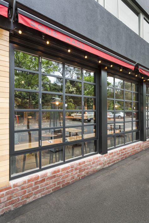 Fixed and bifold steel windows for a new cafe in Spink St, Brighton (Sons of Mary). Photography by Ari Hatzis. Tumblr, Window Restaurant Design, Hotel Window Design, Industrial Window Design, Window Cafe Design, Rustic Cafe Exterior, Commercial Window Design, Glass Cafe Design, Cafe Glass Design