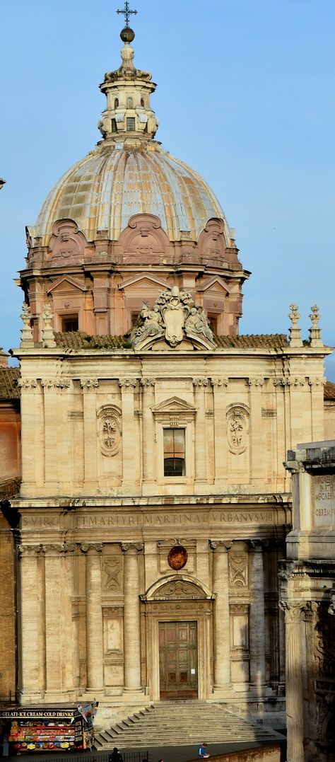 ITALIAN BAROQUE ARCHITECTURE, Cortona; church of Santi Luca e Martina (1634-69), next to Roman Forum, by Cortona. "Cortona's major architectural work, is the church of SS. Luca E Martina. The two storied central section of the facade follows a convex curve, which seems the result of pressure from the rectangular blocks flanking it. Columns are embedded into the convex wall in the manner devised by Michelangelo in the vestibule of the Laurentian Library in Florence." Baroque Architecture, Church Architecture, Italian Baroque Architecture, Laurentian Library, Roman Forum, Italian Baroque, Italian Culture, Architecture Exterior, Indian Designer