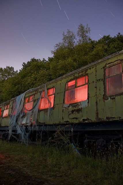 An old train car Old Train Carriage, Abandoned Places At Night, Abandoned Train Car, Abandoned Places Night, Oh Who Is She Aesthetic, Abandoned Places Beautiful, Scary Abandoned Places, Train At Night, Train House