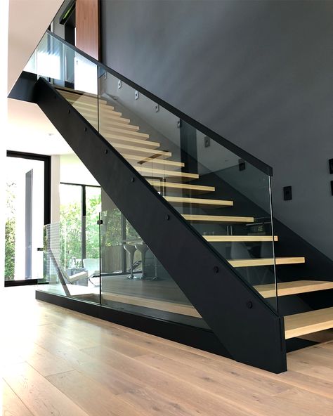 Glass railings with custom black hardware/base shoe. 🔶 | Instagram Stairs Lighting Ideas, Glass Staircase Railing, Black Stair Railing, Black Railing, Glass Railing Stairs, Stairs Lighting, Black Stairs, Glass Railings, Glass Stairs