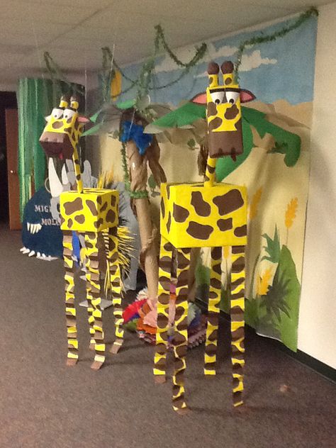 Giraffes Weird Animals VBS hanging from the ceiling, made from boxes Tropisk Fest, Safari Crafts, Weird Animals Vbs, Decoration Creche, Jungle Theme Classroom, Jungle Thema, Visuell Identitet, Jungle Decorations, Vbs Themes