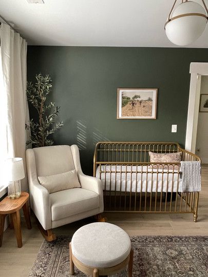 Minimal Woodland Nursery, Nursery Room Configuration, Earthy Gender Neutral Nursery, Earth Tone Primary Bedroom, Gender Neutral Nursery Green Accent Wall, Nursery Prep Timeline, Olive Green Nursery Wall, Green Rustic Nursery, Wallpaper For Nook