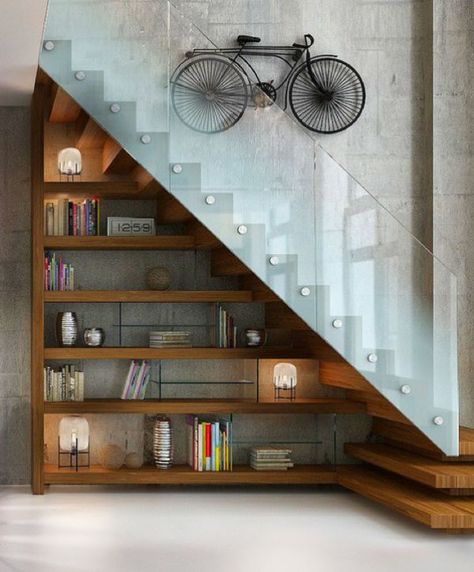 Love books? Love stairs? These fifty unique designs make the most of that tight little cranny under your staircase. Use a block frame to hide books beneath, as تحت الدرج, Stair Shelves, Staircase Storage, House Staircase, Under Stairs Cupboard, Staircase Decor, Stairs Design Modern, Interior Design Per La Casa, Home Stairs Design